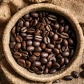 Frame Coffee beans scattered on rough sacking for a rustic feel Royalty Free Stock Photo