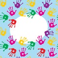 Frame with colorful prints of childrens hands