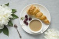 Frame custard cakes cherry flowers peony notepad tea Cup. Flatlay Royalty Free Stock Photo