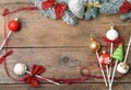 Frame of Christmas themed cake pops on wooden table, flat lay. Space for text Royalty Free Stock Photo