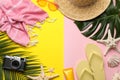 Frame of different beach objects on color background, flat lay. Space for text Royalty Free Stock Photo