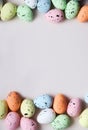 Frame from different colorful easter eggs.Place for text. Royalty Free Stock Photo