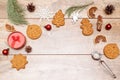 Frame of different delicious christmas gingerbread cookies, decorations, spices on wooden background, flat lay. Copy Royalty Free Stock Photo