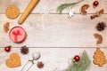 Frame of different delicious Christmas gingerbread cookies, decorations on wooden table, flat lay. Copy space for text Royalty Free Stock Photo