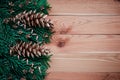 Frame with fir branches, Gingerbread cookies and Christmas decorations on dark stone background Royalty Free Stock Photo
