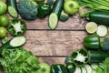 Frame forms the heart Fresh green vegetables and herbs on a wooden background. Copy space Royalty Free Stock Photo