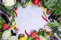 Frame of fresh organic vegetables on a gray concrete background . Healthy natural food top view, copy space . Royalty Free Stock Photo