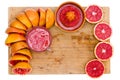 Frame of fresh ruby grapefruit halves Royalty Free Stock Photo