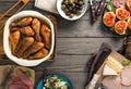 Frame of fried chicken legs, snacks on wooden table