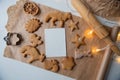 Frame of ginger cookies of different shapes on parchment