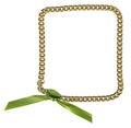 Frame from gold chainlet with green ribbon