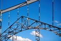 Frame of goods shed. Metal construction of railway building. Old abandoned steel warehouse for goods