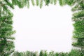 Frame of green prickly young Christmas tree branches on white background. copy space, top view Royalty Free Stock Photo