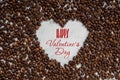 Frame heart from coffee beans with text - Happy Valentine`s day Royalty Free Stock Photo