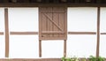 Frame house with half-timbered white wall and brown beams Royalty Free Stock Photo