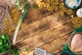 Frame of ingredients for cooking Italian pasta on wooden table Royalty Free Stock Photo