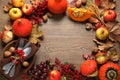 Frame made of autumn vegetables, fruits and cutlery on wooden background, flat lay. Happy Thanksgiving day Royalty Free Stock Photo