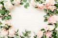 frame made of beautiful pink peonies on white background. Flat lay, top view. Valentine's background. Floral frame Royalty Free Stock Photo