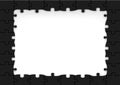 Frame made of black puzzle pieces Royalty Free Stock Photo