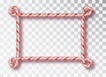 Frame made of candy canes. Blank Christmas border with red and white striped lollipop pattern isolated on transparent Royalty Free Stock Photo