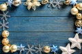 Frame made of Christmas decorations on wooden background Royalty Free Stock Photo