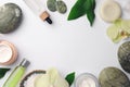 Frame made of different cosmetic products on white table, flat lay and space for text. Spa composition Royalty Free Stock Photo