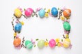Frame made with Easter eggs on background, flat lay. Space for text Royalty Free Stock Photo