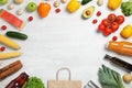 Frame made with fresh vegetables and other products on grey background, flat lay. Space for text Royalty Free Stock Photo