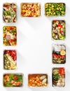 Frame made of healthy food boxes on white background Royalty Free Stock Photo