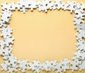 Frame made of jigsaw puzzle pieces on color background Royalty Free Stock Photo