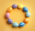 Frame made of painted Easter eggs on color background, top view Royalty Free Stock Photo