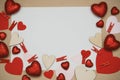 Frame Made of Paper Red Hearts with copy space. Blank Paper for text Mesage arrounded with hearts. Valentine`s Day Top view, love Royalty Free Stock Photo