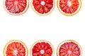 Frame made of sliced bloody oranges isolated on white background. Fresh ripe red sicilian orange, citrus fruit, free space for Royalty Free Stock Photo