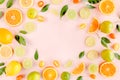 Frame made of summer tropical fruits: orange, lemon, lime, mango on pink background. Food concept. flat lay, top view Royalty Free Stock Photo