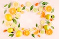 Frame made of summer tropical fruits: orange, lemon, lime, mango on pink background. Food concept. flat lay, top view Royalty Free Stock Photo