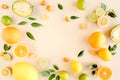 Frame made of summer tropical fruits: orange, lemon, lime, mango on yellow background. Food concept. flat lay, top view Royalty Free Stock Photo