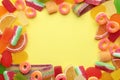 Frame made with tasty jelly candies on color background Royalty Free Stock Photo
