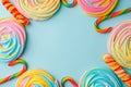 Frame made with tasty sugar candies on color background, top view. Space for text, party, candy bar, childhood, birthday concept Royalty Free Stock Photo