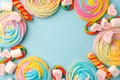 Frame made with tasty sugar candies on color background, top view. Space for text, party, candy bar, childhood, birthday concept Royalty Free Stock Photo