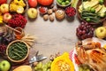 Frame made of turkey, autumn vegetables and fruits on wooden background. Happy Thanksgiving day Royalty Free Stock Photo