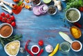 Frame made of various spices, herbs and vegetables on wooden background Royalty Free Stock Photo