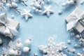 Frame made of white decorations on pastel blue background Royalty Free Stock Photo