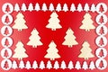 A frame made of white, wooden Christmas trees isolated on a red background, inside a large, wooden Christmas tree. Royalty Free Stock Photo