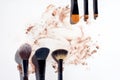 Frame of makeup brushes with powder foundation Royalty Free Stock Photo