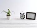 Frame mock up and black clock Royalty Free Stock Photo