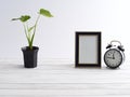 Frame mock up and black clock Royalty Free Stock Photo
