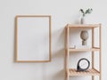 frame for mock up hangs on white wall,shelf and decoration Royalty Free Stock Photo