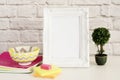 Frame Mock up. White Frame mockup. Styled Stock Photography. Notebooks, Bonsai Plant. Template Product Mock-up. Empty Frame Royalty Free Stock Photo