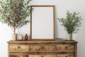 Frame mockup picture on vintage dresser against white wall in minimalist room, detail of Scandinavian interior with blank poster, Royalty Free Stock Photo