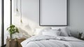 Frame mockup picture on white wall in bedroom, detail of modern room interior with blank poster, bed, linen and pillows. Concept Royalty Free Stock Photo